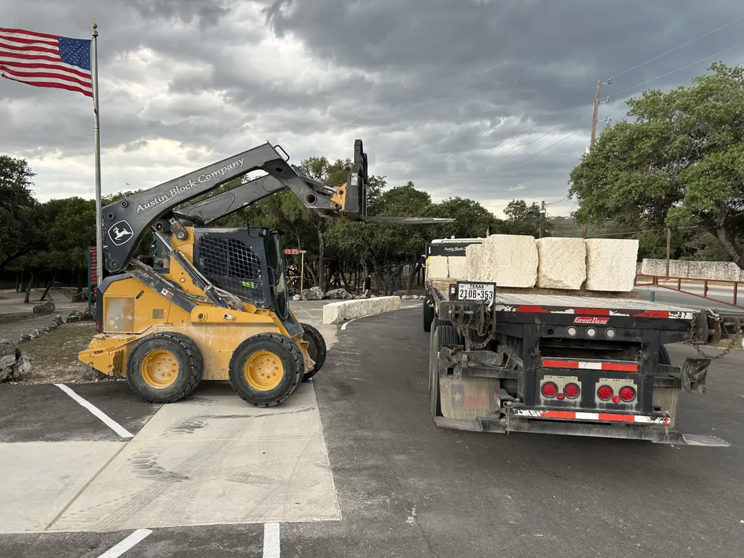 Flatbed freight loaded with block material for delivery