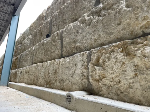 Retaining wall concrete footing